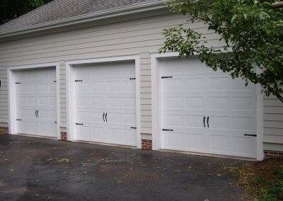 Amega white stamped carriage garage door