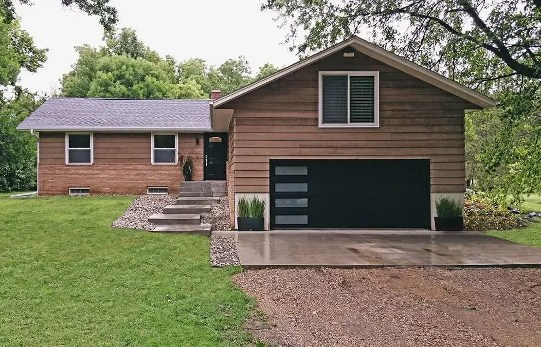 flush panel residential garage door with windows