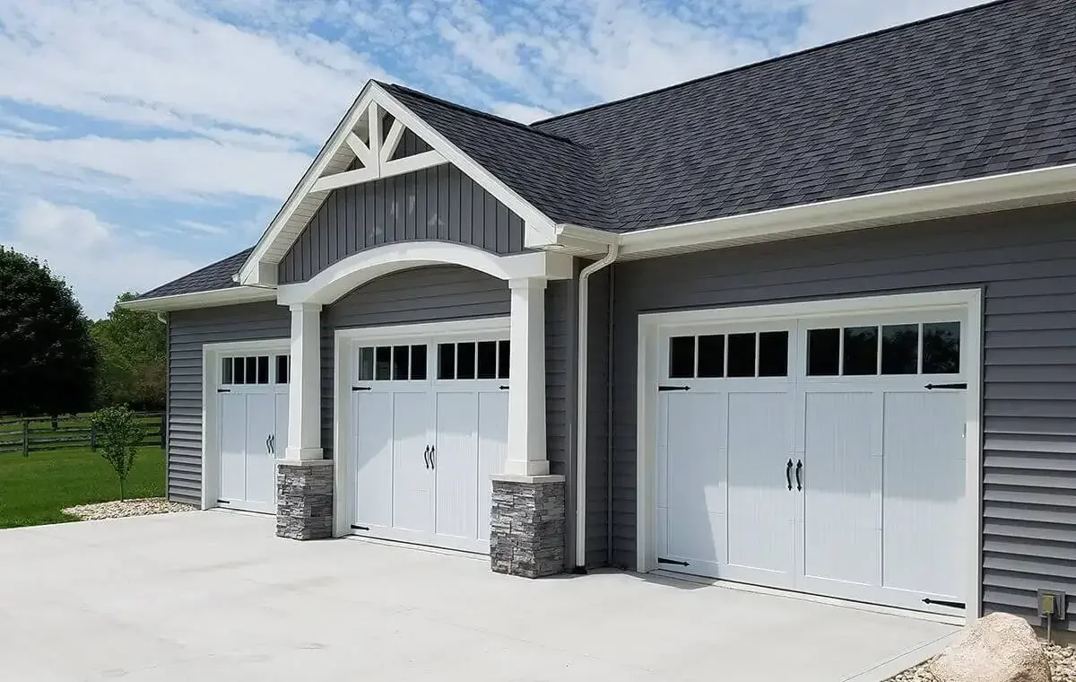 new Amega garage door on residential home