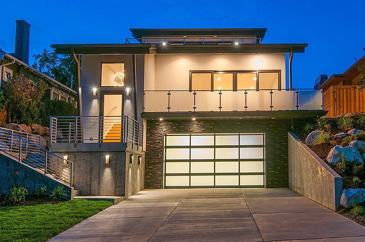 Large home with a full glass garage door