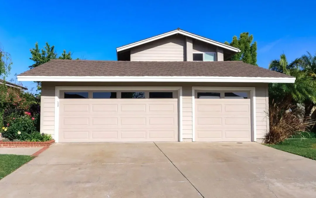 home with three car garage in a neighborhood